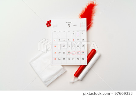Female menstruation calendar and hygienic pads top view 97609353