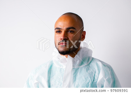African american man doctor in protective uniform against white background African american man doctor in protective uniform against white background 97609391