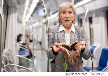 Senior woman was robbed in subway train Senior woman was robbed in subway train 97609392