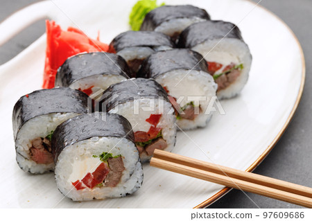 Maki sushi roll served on plate close up 97609686
