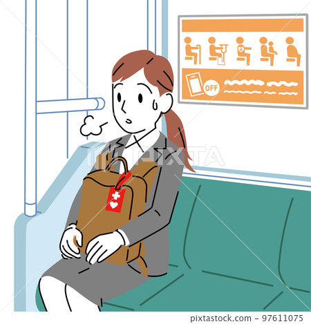 A woman sitting in a priority seat with a simple touch help mark A woman sitting in a priority seat with a simple touch help mark 97611075