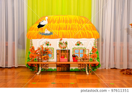 Ukrainian village house with a thatched roof craft 97611351