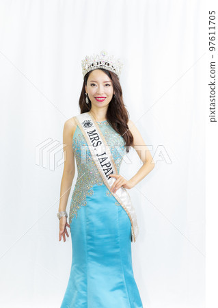 A woman in a dress 97611705