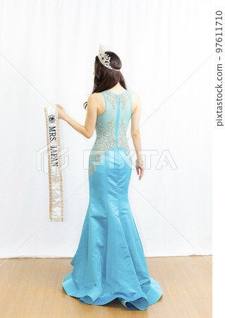 A woman in a dress 97611710