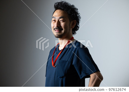 man with beard in scrubs man with beard in scrubs 97612674
