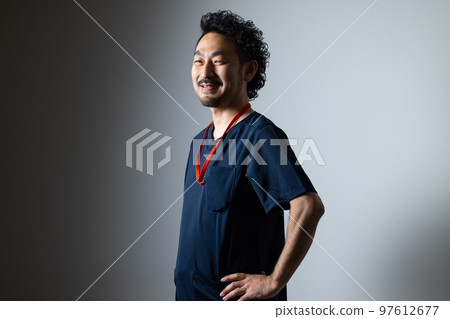 man with beard in scrubs 97612677
