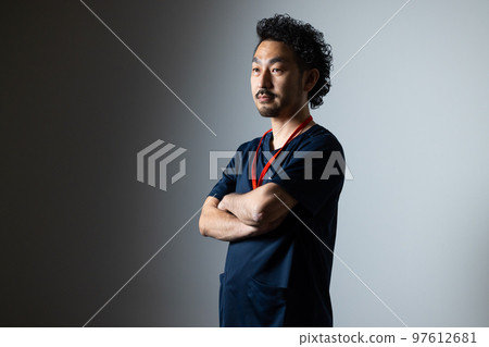 man with beard in scrubs 97612681