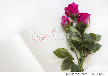 i love you message card handwriting on notebook with rose flowers i love you message card handwriting on notebook with rose flowers 97613265