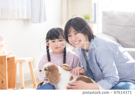 Family A girl and a mother who take care of pets 97614371