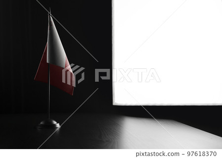 Small national flag of the Malta on a black background Small national flag of the Malta on a black background 97618370