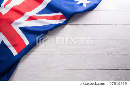 Happy Australia day concept. Australian flag against white wooden background. 26 January. 97619219