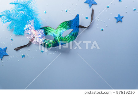 Happy Purim carnival decoration concept made from mask and sparkle star and hamantaschen cookies on pastel background. (Happy Purim in Hebrew, jewish holiday celebrate) 97619230
