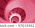 Old stairs in spiral staircase toned in Color of year 2023. Viva magenta. 97619362