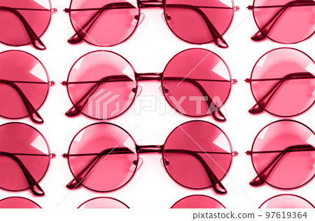 Color of year 2023.Viva magenta. Pink style glasses isolated on white background Color of year 2023.Viva magenta. Pink style glasses isolated on white background 97619364