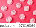 colorful marshmallows on magenta background. Color of year 2023. Viva magenta. Color sweet homemade zephyr 97619369