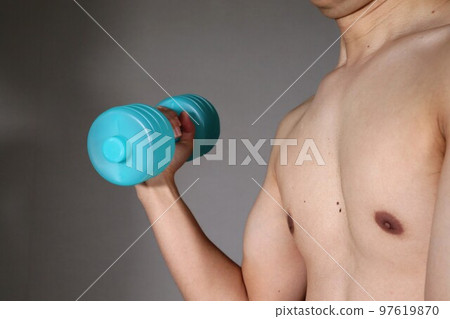 Japanese man doing muscle training Japanese man doing muscle training 97619870