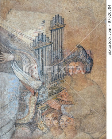 Saint Cecilia, fresco on house facade in Zagreb, Croatia 97620384