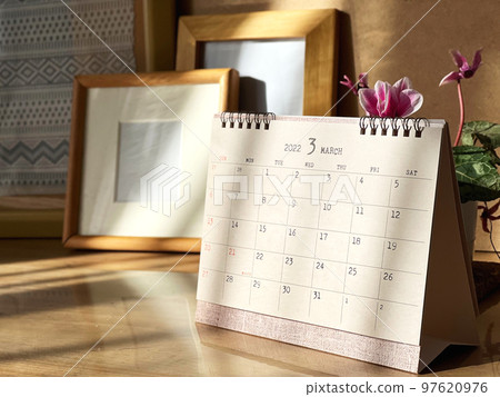 March desk calendar, photo frame and flower_diagonal 97620976