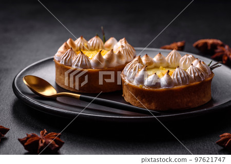Delicious fruity sweet tart with lemon flavor and cream Delicious fruity sweet tart with lemon flavor and cream 97621747