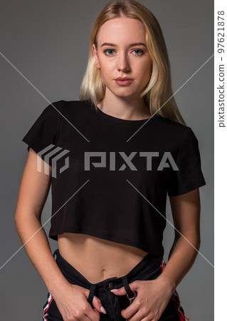 Portrait of woman with natural skin on gray background Portrait of woman with natural skin on gray background 97621878