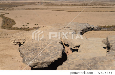 Plain rock viewpoint to the desert, focus on rock 97623433