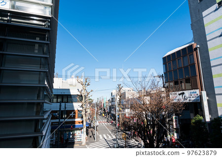 Seijogakuen-mae Station, the townscape in front of the station, the clear blue sky in winter, Setagaya-ku, Tokyo 97623879