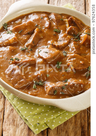 Carbonnade a la Flamande Flemish Beef Stew closeup on the pot. Vertical Carbonnade a la Flamande Flemish Beef Stew closeup on the pot. Vertical 97624358