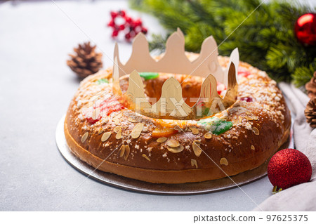 Roscon is a traditional Spanish Christmas pastry, decorated with crown Roscon is a traditional Spanish Christmas pastry, decorated with crown 97625375