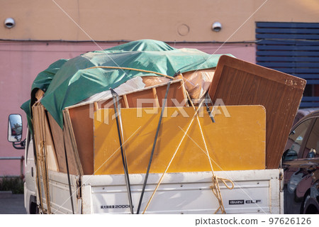 Collection of disused items and oversized garbage 97626126