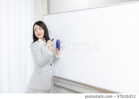Young woman and whiteboard lesson presentation Young woman and whiteboard lesson presentation 97626852
