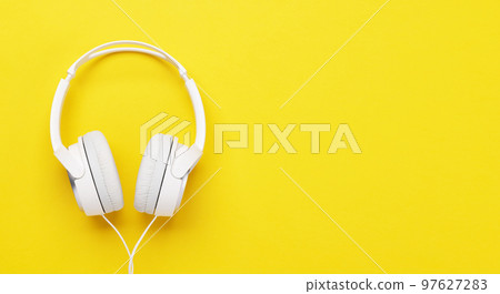 Headphones on yellow 97627283