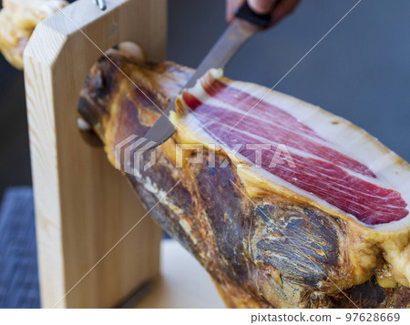 cutting raw wood ham 97628669