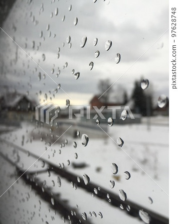 waterdrops on train window waterdrops on train window 97628748