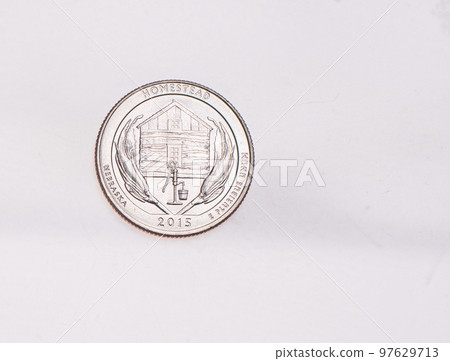 US Dollar coins President series $1 golden colored. The United States Mint honors our nation's presidents. Overhead flat lay US Dollar coins President series $1 golden colored. The United States Mint honors our nation's presidents. Overhead flat lay 97629713