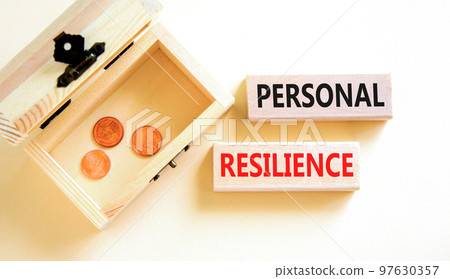 Personal resilience symbol. Concept word Personal resilience on wooden blocks. Beautiful white background. Wooden chest with coins. Business psychological personal resilience concept. Copy space. Personal resilience symbol. Concept word Personal resilience on wooden blocks. Beautiful white background. Wooden chest with coins. Business psychological personal resilience concept. Copy space. 97630357