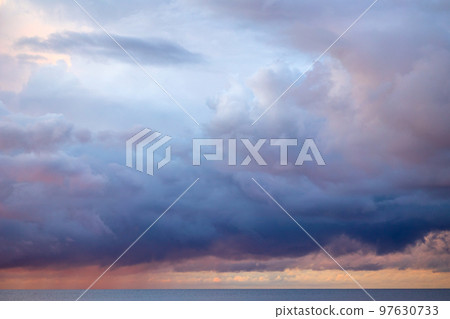 stormy clouds at sunset stormy clouds at sunset 97630733