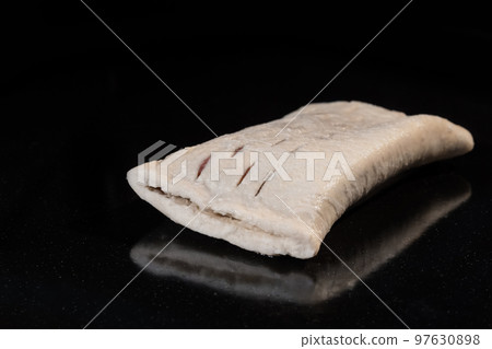 Uncooked bun with strawberry jam in electric oven: close up, black background Uncooked bun with strawberry jam in electric oven: close up, black background 97630898