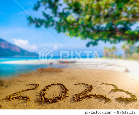 2023 written in sand New Year on the beach 2023 written in sand New Year on the beach 97632132