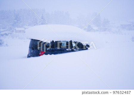 Car buried in heavy snow Car buried in heavy snow 97632487