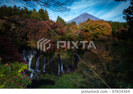 Autumn colors make the waterfalls in the forest Japan Autumn colors make the waterfalls in the forest Japan 97634364