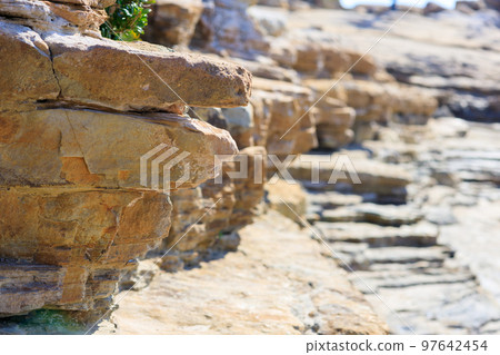Scenery of ria coastline and lapping waves in Wakayama Prefecture 97642454