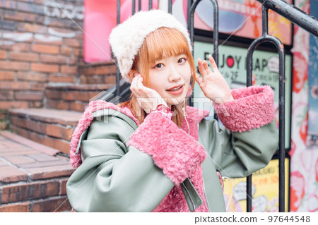 Harajuku gal fashion girl listening to music 97644548