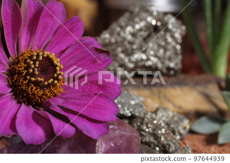 Chakra Stones and Flowers With Australian Red Sand on Meditation Table Chakra Stones and Flowers With Australian Red Sand on Meditation Table 97644939