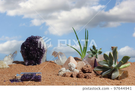 Chakra Stones and Flowers on Australian Red Sand Chakra Stones and Flowers on Australian Red Sand 97644941