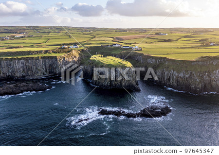 Dunseverick Castle is located west of the village of Dunseverick, in County Antrim, in Northern Ireland. Dunseverick Castle is located west of the village of Dunseverick, in County Antrim, in Northern Ireland. 97645347