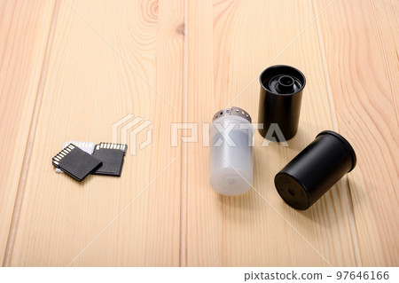 Old 35 mm film and modern flash drives for a digital camera. Old 35 mm film and modern flash drives for a digital camera. 97646166