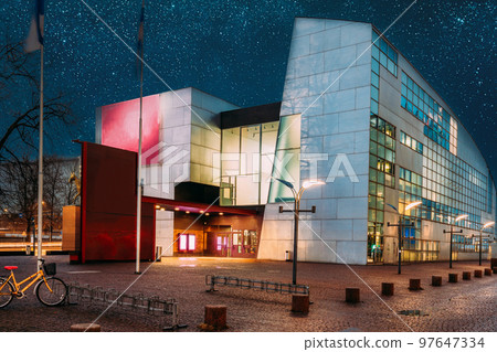 Helsinki, Finland. Evening Night View Of Kiasma Contemporary Art Museum. Museum Exhibits Contemporary Art Collection Of Finnish National Gallery. Colourful Night Dark Blue Starry Sky In Blue Colors 97647334