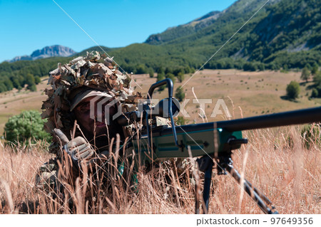 Army soldier holding sniper rifle with scope and aiming in forest. War, army, technology and people concept 97649356