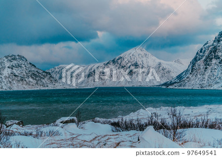 Norway coast in winter with snow bad cloudy weather Norway coast in winter with snow bad cloudy weather 97649541