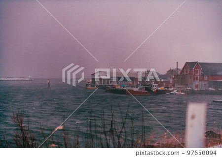 Traditional Norwegian fisherman's cabins and boats Traditional Norwegian fisherman's cabins and boats 97650094